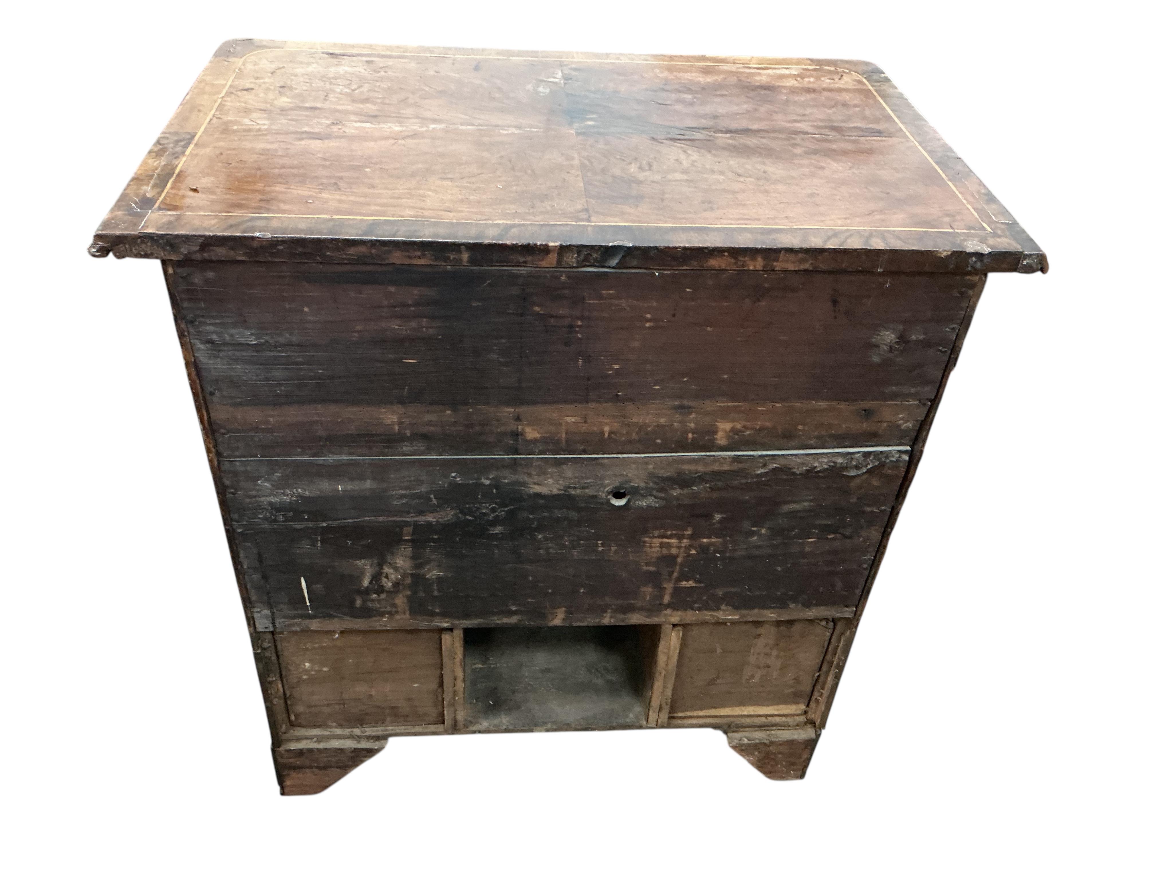 An 18th century walnut kneehole desk, width 79cm, depth 49cm, height 84cm